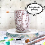 handmade artist tools ceramic paint palette brush water jar with girl