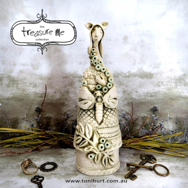 treasure me ceramic figurine girl with moth 1