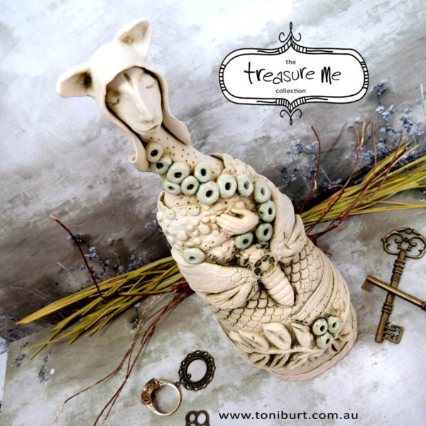 treasure me ceramic figurine girl with moth 2