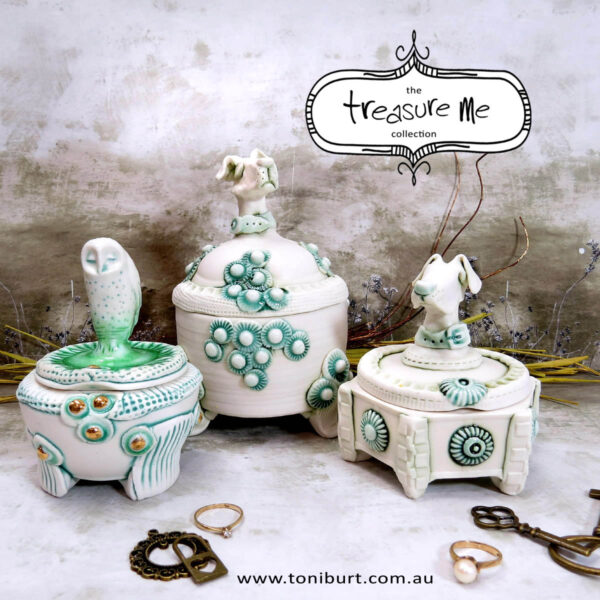 porcelain hounds on lidded boxes with owl pair in copper